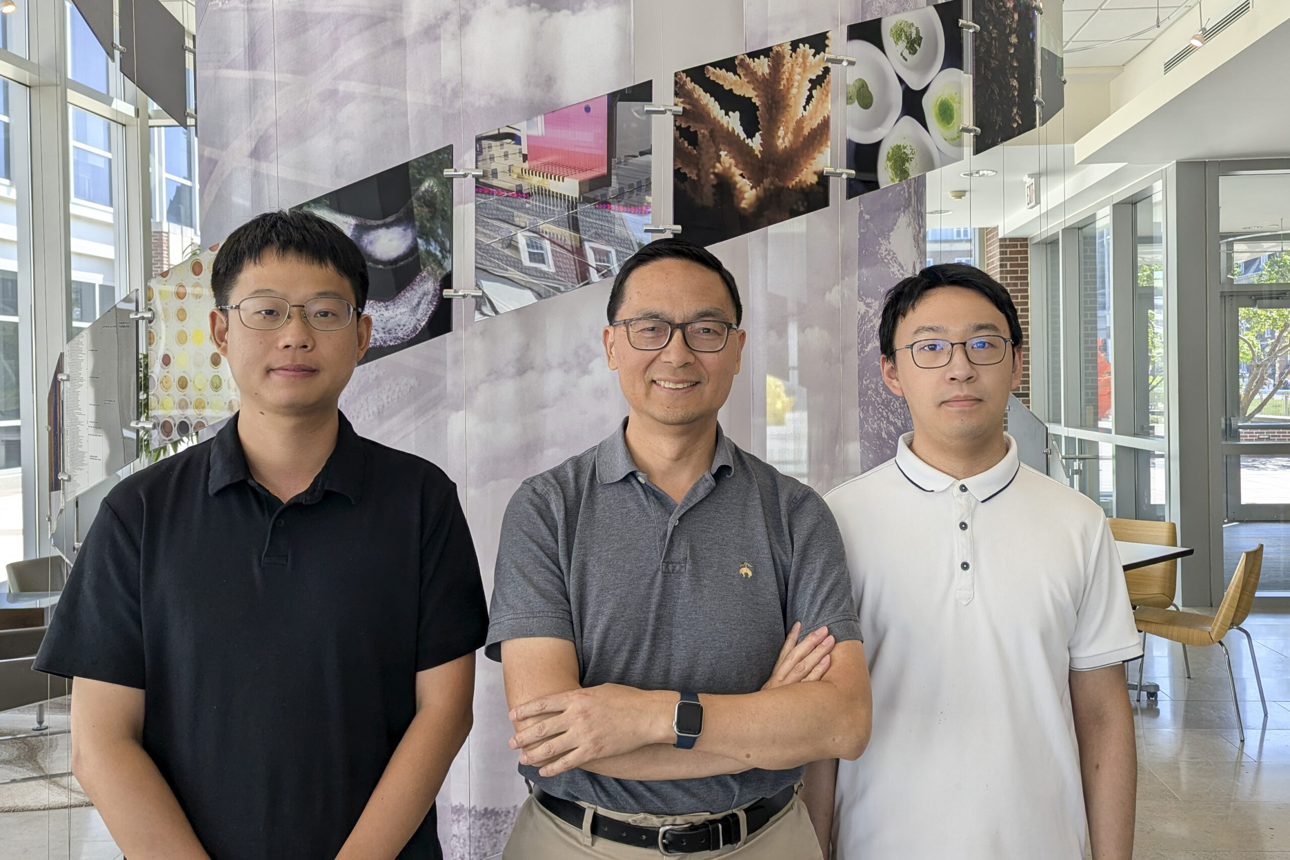 Yi Zhou, Huimin Zhao, and Yifei Ge pose for a photo.